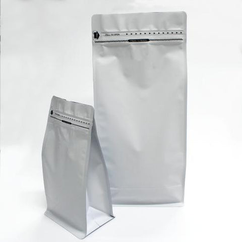 Matt White Flat Bottom Stand Up pouch with coffee valve